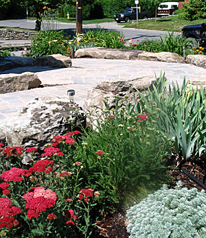 Natural stone patio with garden